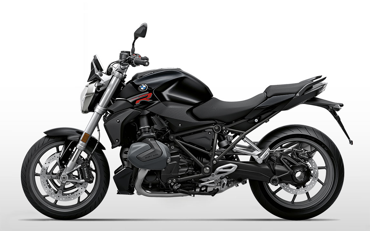Et billede, der indeholder motorcykel, parkeret, udendrs, vej

Automatisk genereret beskrivelse