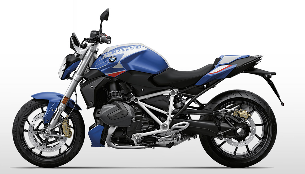 Et billede, der indeholder motorcykel, udendrs, vej, parkeret

Automatisk genereret beskrivelse