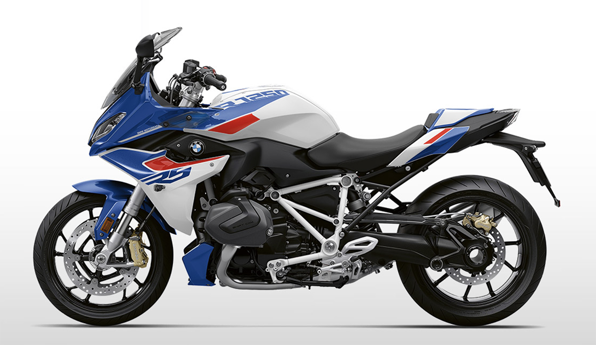 Et billede, der indeholder motorcykel, udendrs, bl, motorcykling

Automatisk genereret beskrivelse