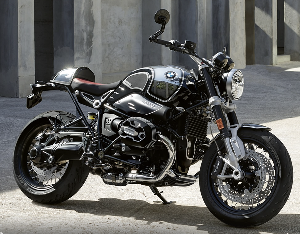 Et billede, der indeholder motorcykel, udendrs, bygning, vej

Automatisk genereret beskrivelse