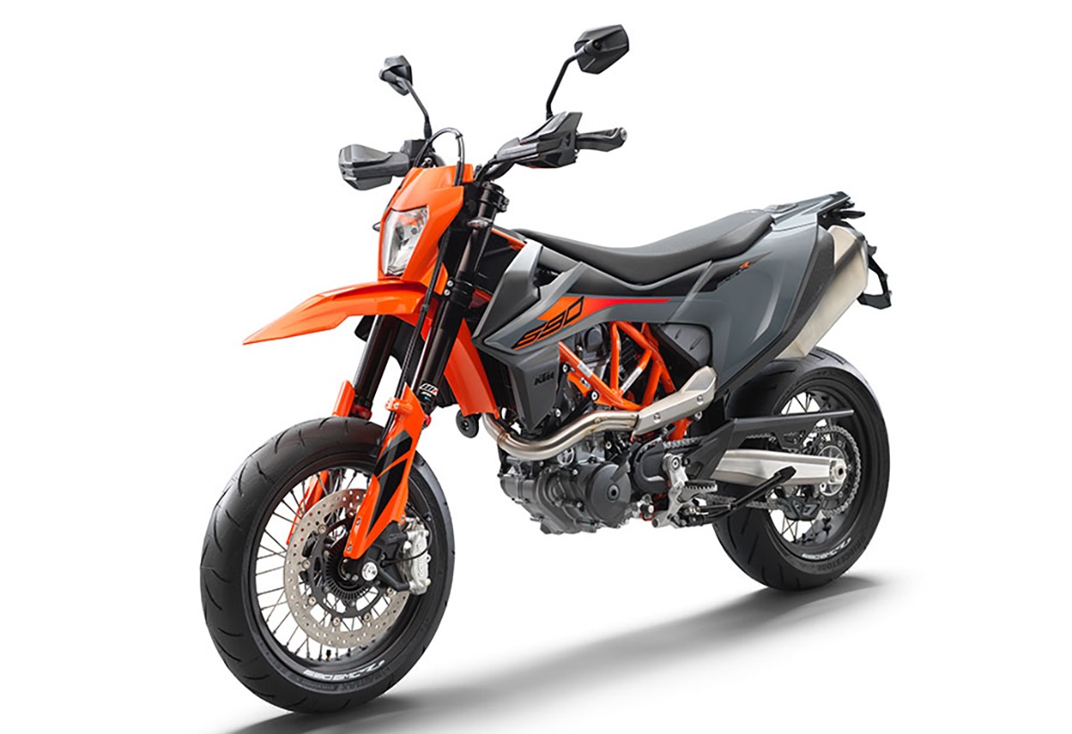 Et billede, der indeholder motorcykel, udendrs, parkeret, orange

Automatisk genereret beskrivelse
