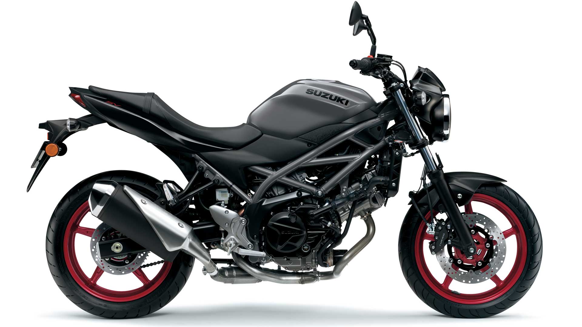 Et billede, der indeholder motorcykel, parkeret, udendrs, slv

Automatisk genereret beskrivelse
